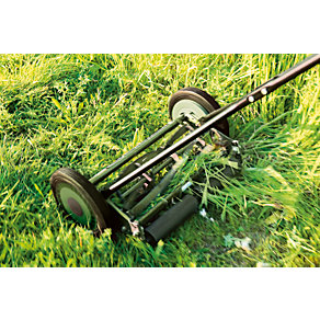 Manually operated mower similar-image